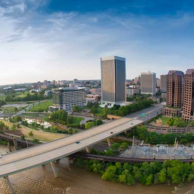 aerial view of the james river, a bridge, and downtown richmond, virginia